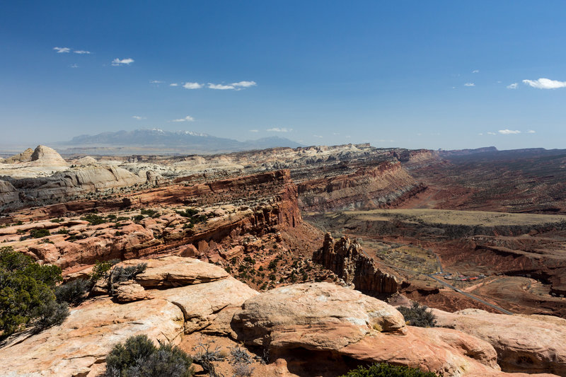 Waterpocket Fold from Navajo Nobs with Henry Mountains in the background