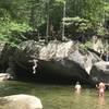 Jumping into swimming hole along Franconia Falls Trail