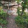 Maybe a fun boulder problem alongside the trail between El Cap Rock and Pretty Valley.