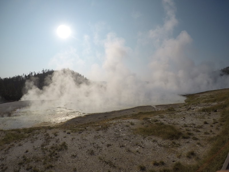 Steam raising off of Excelsior Geyser Crater.