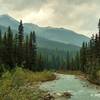 The Blaeberry River, looking upstream (northwest) towards Howse Pass and surrounding mountains, as seen from the David Thompson Heritage Trail.