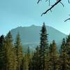 Lassen Peak. Looking closely, the slopes are completely cleared of trees. These slopes were swept away in the May 1915 eruptions.