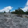 Looking at the summit of Jockey Cap after hiking over the top.  Take time to explore the summit and the views.