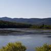 From a small bench on the side of the trail, the best view of Shell Pond and the surrounding mountains spreads out before you.