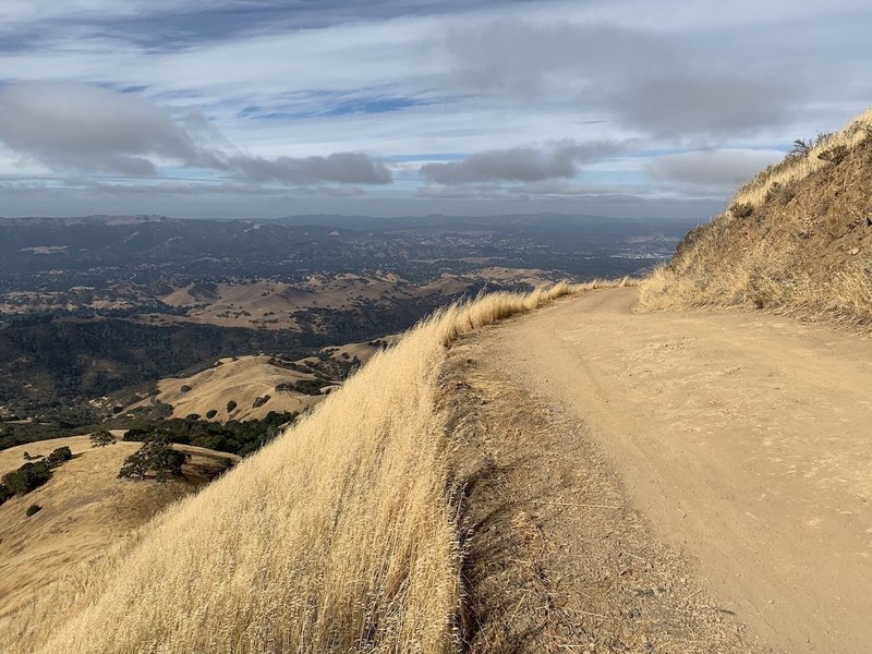 The route is well-kept and exposed, with sweeping views and occasional brisk gusts — especially close to the summit.