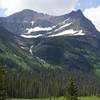 In the spring, snow still clings to the mountains. The views open up as you approach the Saint Mary River.