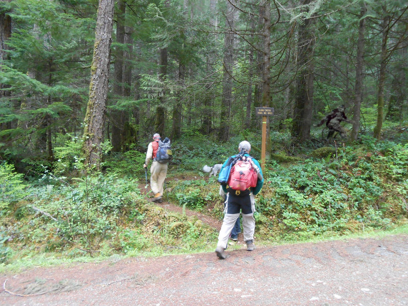 Trailhead sign at Elbo Creek. Three of us start the hike.