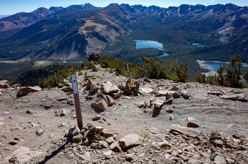 Looking down the Dragon's Back Trail toward Lake Mary, Lake George, and Horsehoe Lake from the ridge below the summit of Mammoth Mountain.