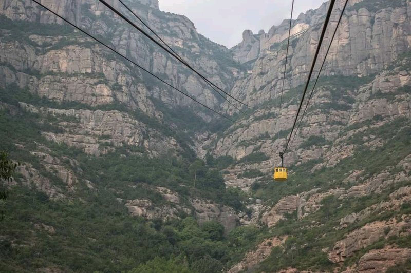 The cable car (funicular aeri) and Montserrat Monastery in the upper right.