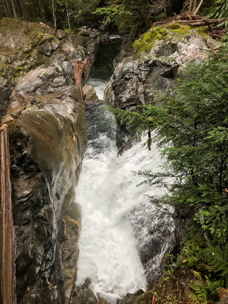 Small waterfall pouring into a 90 degree bend.