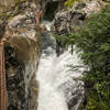 Small waterfall pouring into a 90 degree bend.