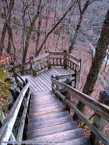 On the Ha Ha Tonka Spring Trail, above the spring. Looking back down the stairs from the spring, with the lower trail visible in the right side distance.  About:  37.973922, -92.766711