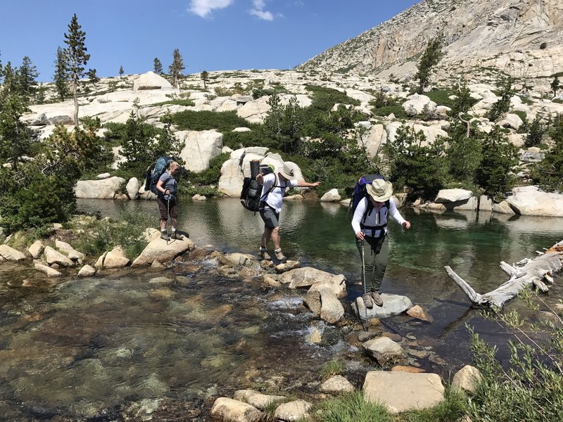 Stream crossing below the first lake to reach the north side of the lakes. Not hard at all to cross in August