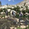 Stream crossing below the first lake to reach the north side of the lakes. Not hard at all to cross in August