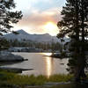 Lake of the Woods with the sun setting through wild fire smoke in the distance