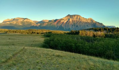 Vimy Peak in the setting sun, looking southeast along Red Rock Parkway.