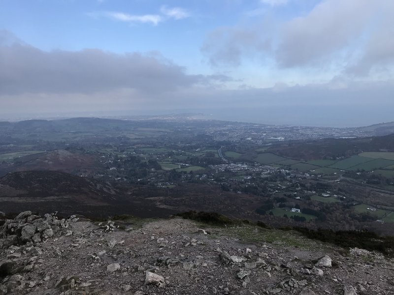 Hazy view of Dublin from peak