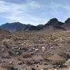 Closer view of backside of Black Mountain and remains of volcanic rock. Near 701 trail shortcut.