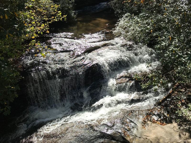 Looking up river from the suspension bridge crossing above Raven Cliff Falls. This water is what creates the 400 foot falls below.