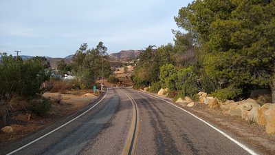 Road section....it's painfully steep! Get ready to turn right onto a trail.