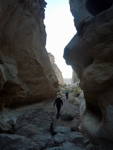 Emerging from the winding canyon into a more open space.