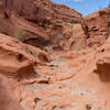 The surface of the rocks is a clear indication of the sheer force of water, especially during a flash flood