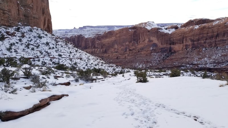 The steep anticline can get tricky if snowfalls. Hiking poles would help, regardless of season