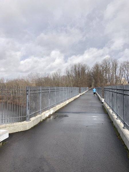 The trail on a former rail bridge over the Farmington River