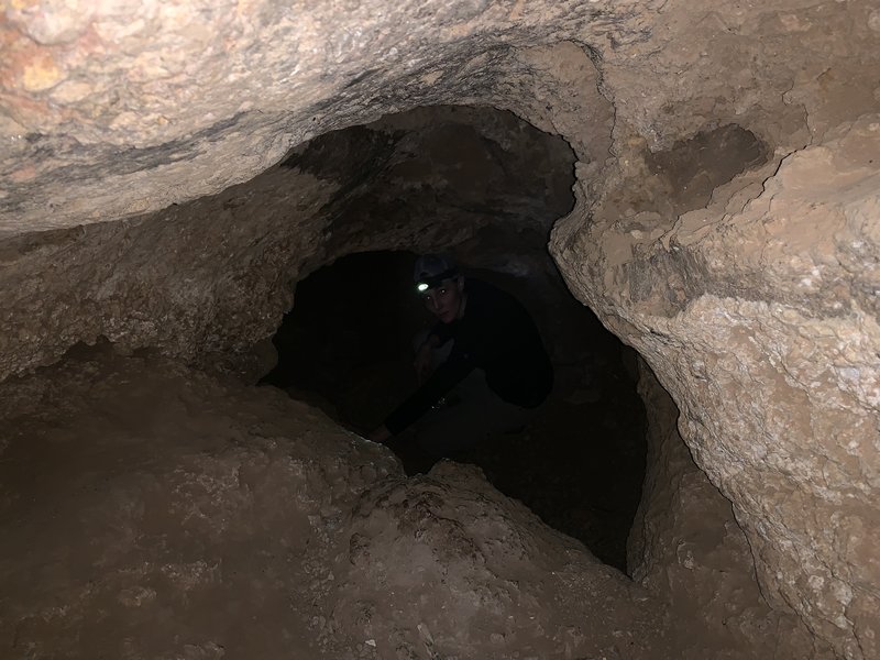 Some tight but not too difficult crawl spaces leading between the accessible rooms within the cave. Dress appropriately and bring adequate lighting as it gets dark and warm the deeper you go.