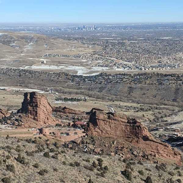 Red Rocks Amphitheatre and Denver in background.