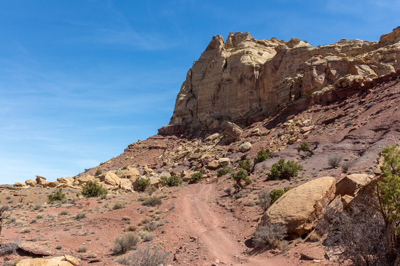 The Behind-the-Reef Road follows the edge of the Crack Canyon Wilderness Study Area