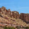 Stay right when you approach this rock formation to get to Little Wild Horse Canyon