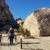 Very beginning of trail. You'll climb up and over the shadowy low area in the center, via man made steps. This gives you access to the contained valley.