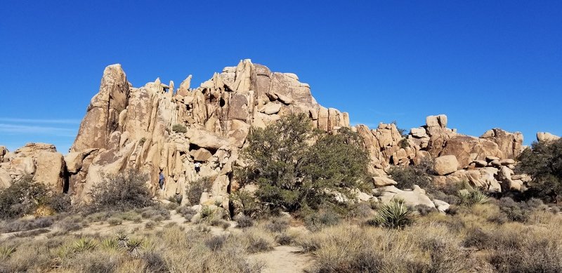 Some of the rock formations walling the valley. Note the people climbing (for scale), picture center and slightly left. Taken facing NE @ about 130pm.