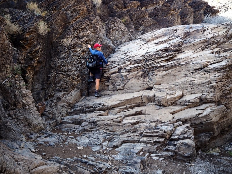 Climbing the last waterfall just below the petroglyphs