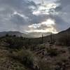 A pretty break in a winter storm, looking directly west of the trail towards San Tan Mountain. This wash is about 0.5 miles from the south end of the Dynamite Trail.