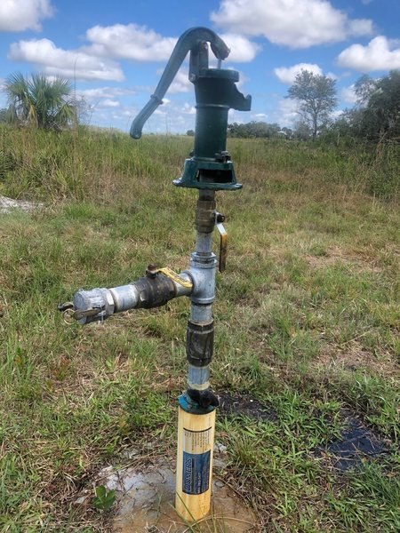 Cowboy  tossing Water Well