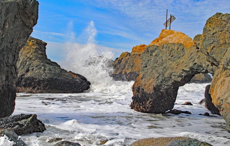 Colorful rock formations and waves and Mussel Rock Park