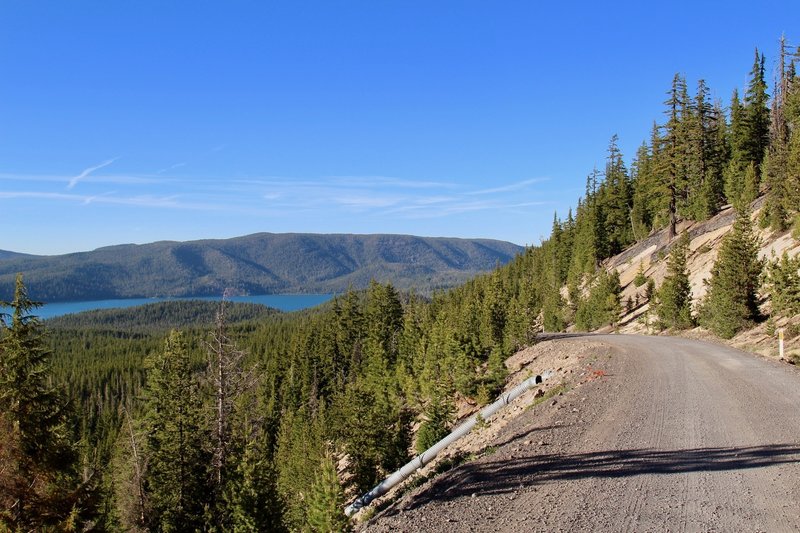 Paulina Peak unpaved road as lake is seen