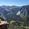 Eastern Yosemite Valley in front of a snowy mountain range backdrop.