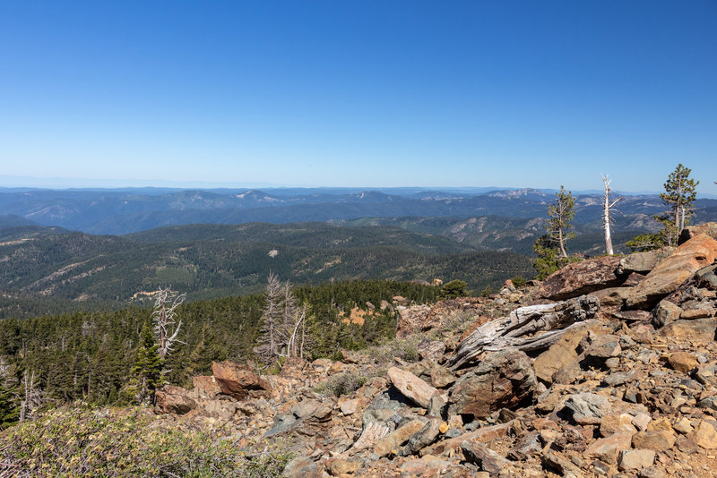 Far reaching views from the rocky top of Sierra Buttes