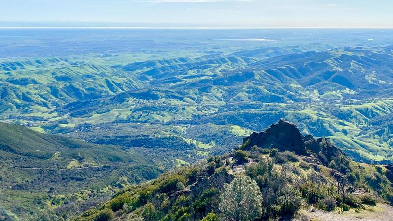 View from top: Rain has painted the mountain and valley with all shades of green.