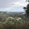 View above the ranch house, Monterey Bay and Santa Cruz is in the distance.