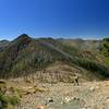 Climbing Eagle Mountain with Whetstone Butte in the distance.