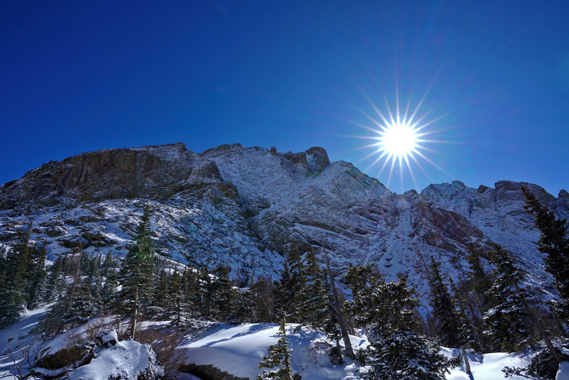 Wintertime at Willow Lake. This cliff overlooks the lake and the trail up its backbone leads to Challenger Point.