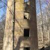 The grain Storage at the Old homestead.  Has long sat empty, and an old foundation still remains built from stone.