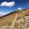 On the way to the summit looking west.