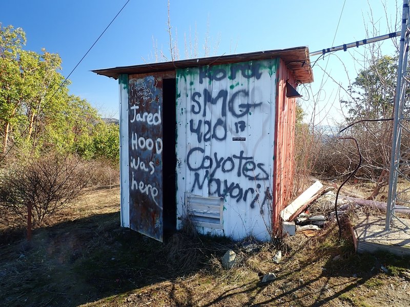 The colorful old comm shack atop Tin Pan Peak