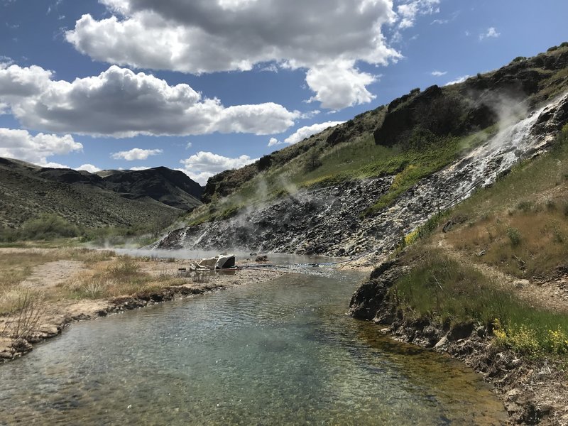 An excellent hot spring that gushes out of the side of the canyon wall.