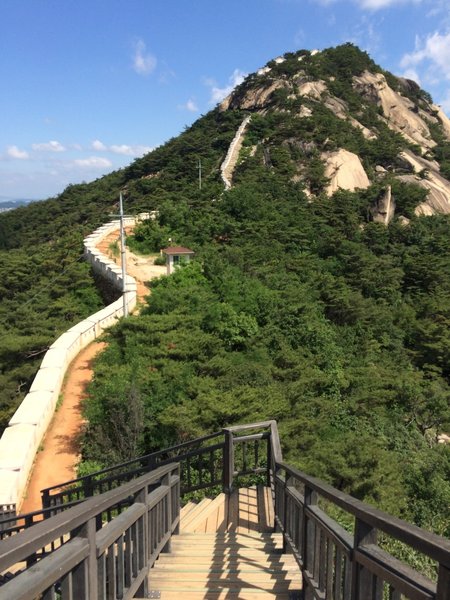 Wall climbing to mountain top